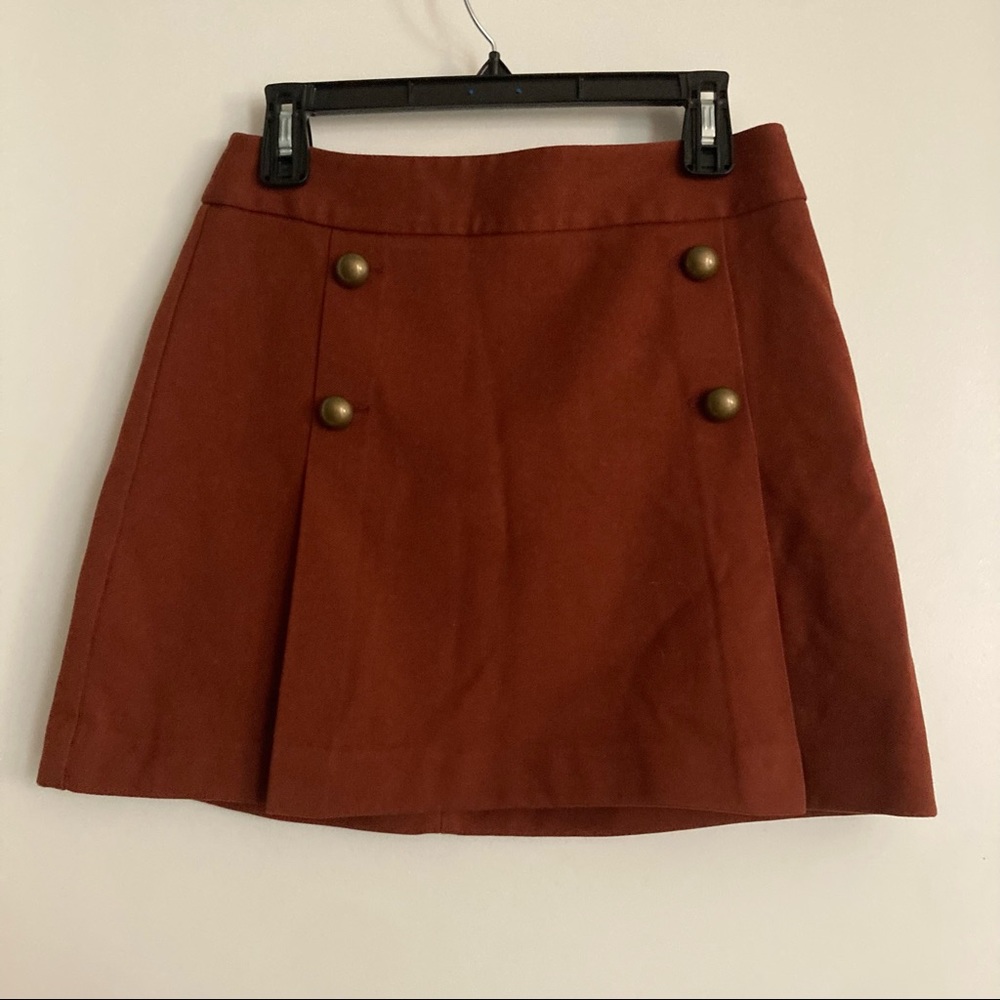 Copper, pleated mini skirt with gold buttons. Express size 6.